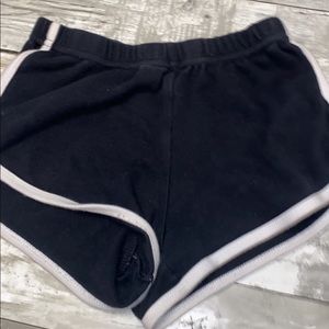 White and black shorts.